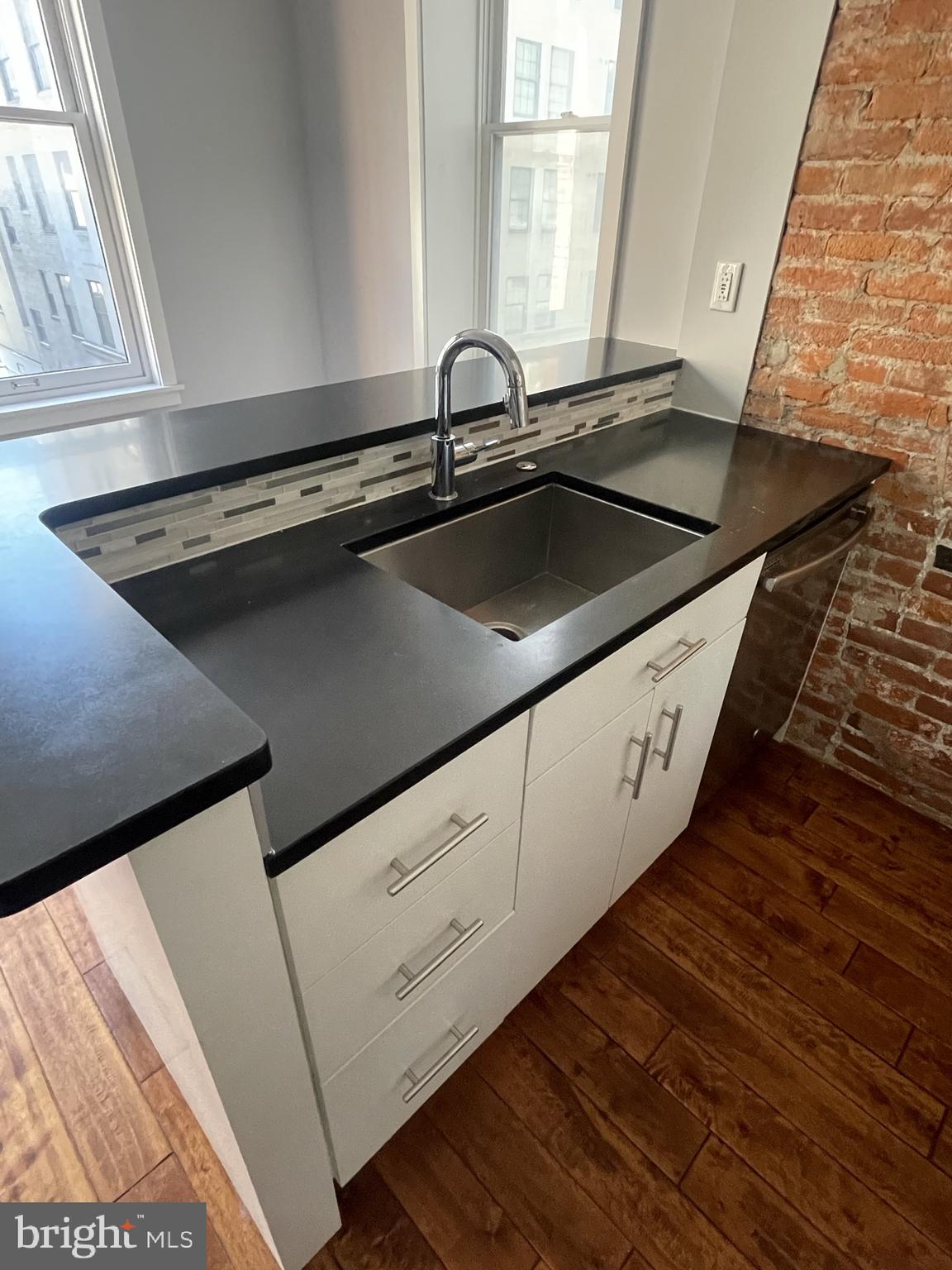 126 South 16th Street, Unit 3F Philadelphia, PA 19102 - Photo 4 of 11 a close view of sink and tap