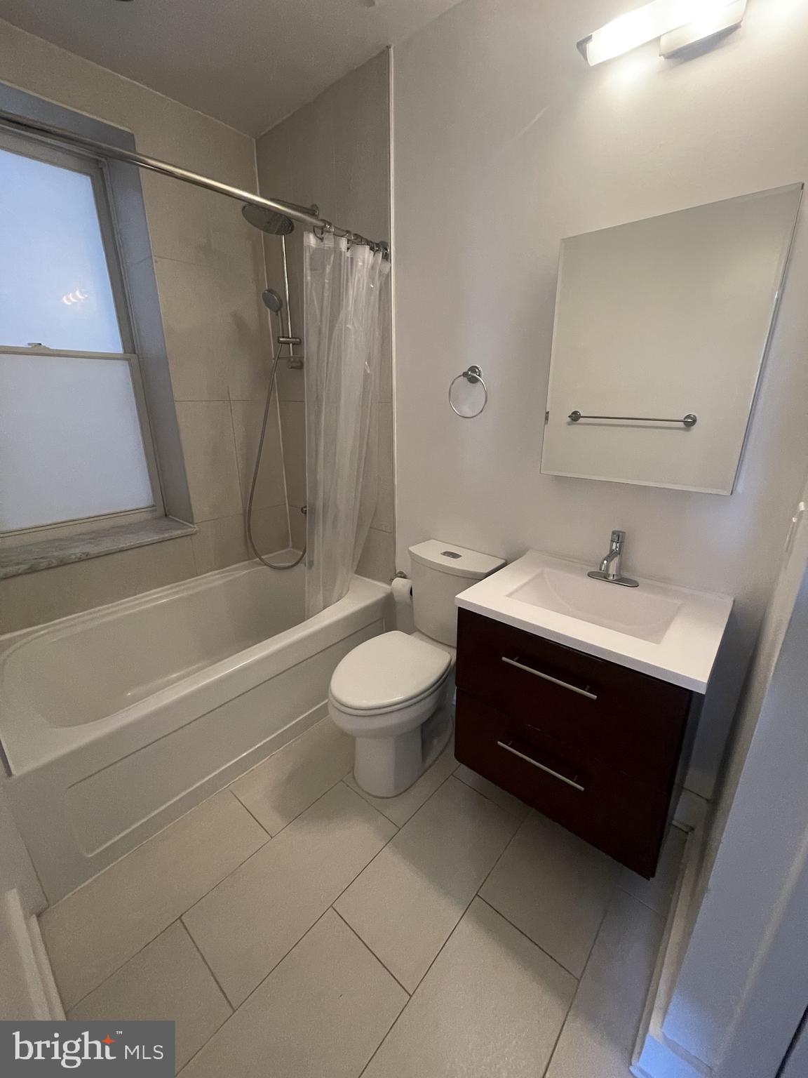 126 South 16th Street, Unit 3F Philadelphia, PA 19102 - Photo 7 of 11 a bathroom with a sink a toilet and shower
