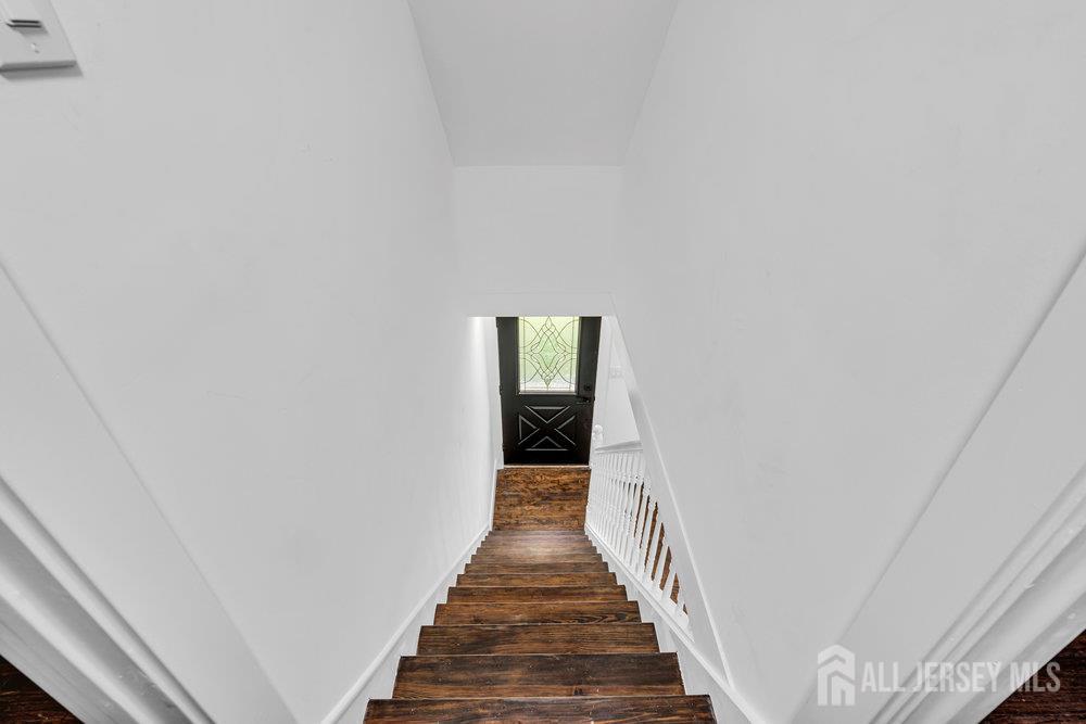 99 Crestview Road Fords, NJ 08863 - Photo 20 of 36 a view of a hallway with wooden floor
