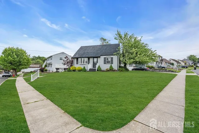 a front view of house with garden