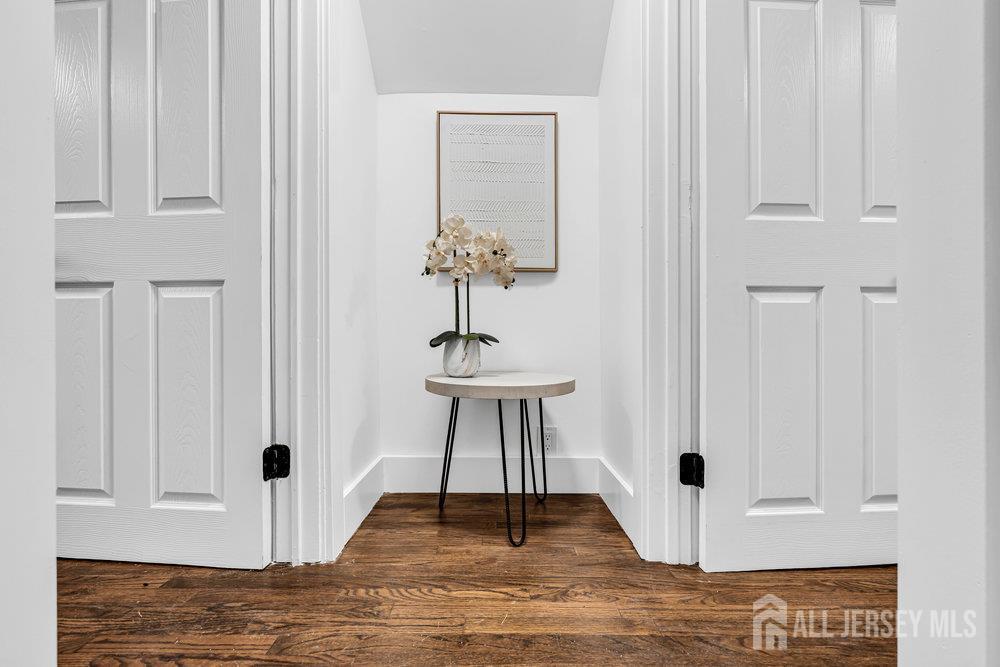 99 Crestview Road Fords, NJ 08863 - Photo 21 of 36 a view of a livingroom with wooden floor and staircase