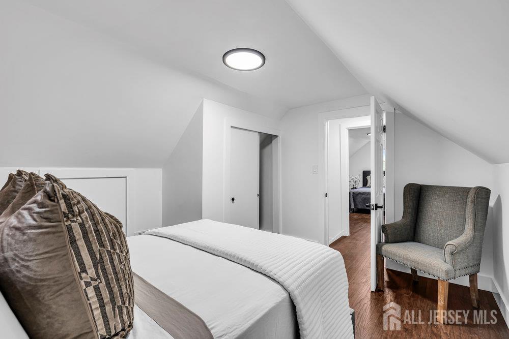 99 Crestview Road Fords, NJ 08863 - Photo 28 of 36 a bedroom with a bed and a chair