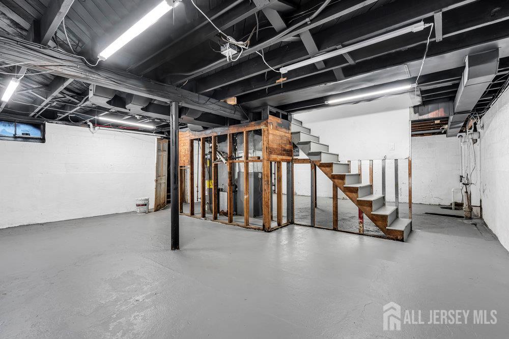 99 Crestview Road Fords, NJ 08863 - Photo 29 of 36 a view of a storage room with stairs
