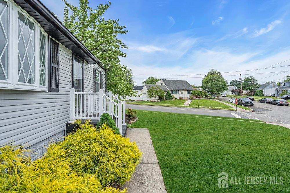 99 Crestview Road Fords, NJ 08863 - Photo 3 of 36 a view of a garden with a pathway