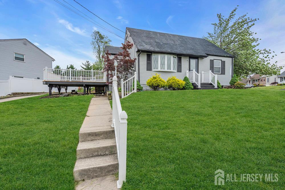 99 Crestview Road Fords, NJ 08863 - Photo 4 of 36 a front view of a house with garden