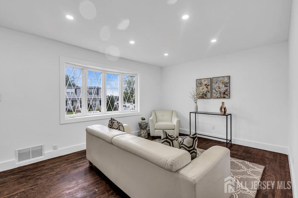 99 Crestview Road Fords, NJ 08863 - Photo 6 of 36 a living room with furniture and window
