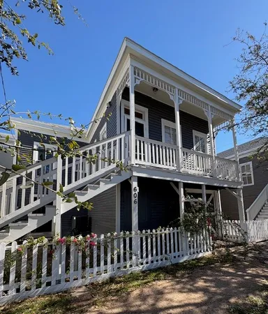 a front view of a house with balcony
