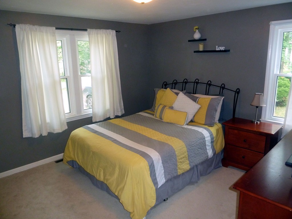 80 Edgewater Road Mashpee, MA 02649 - Photo 6 of 19 a bedroom with a bed and window