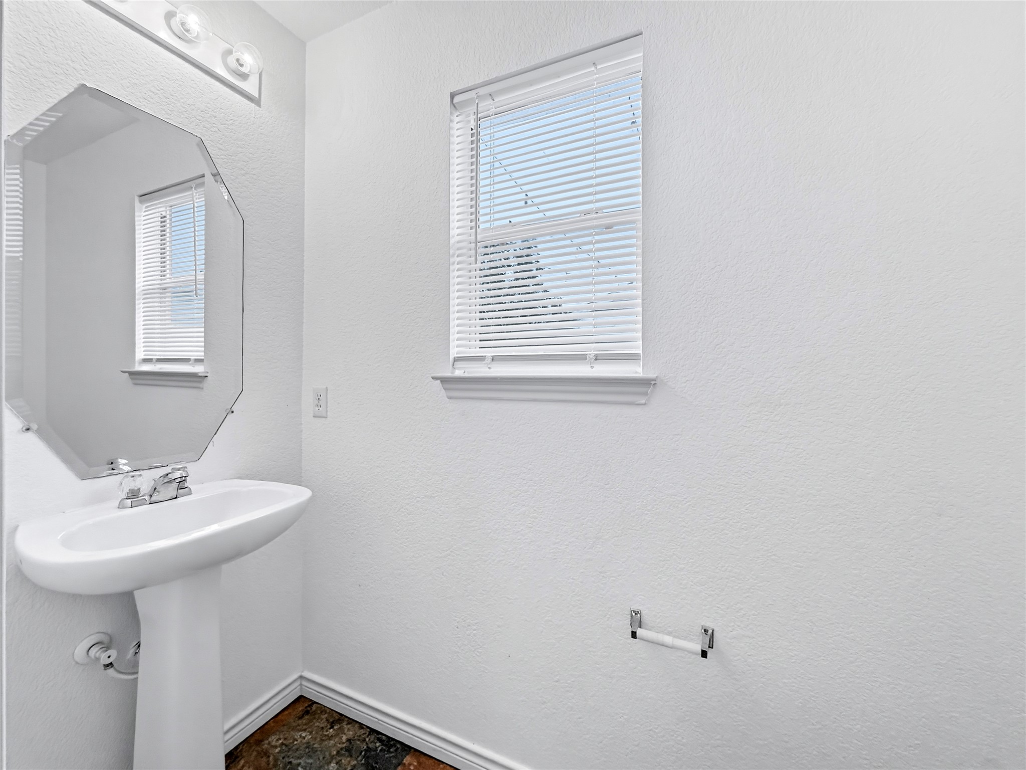 9215 Rowlands Sayle Road Austin, TX 78744 - Photo 5 of 14 Downstairs Half Bathroom