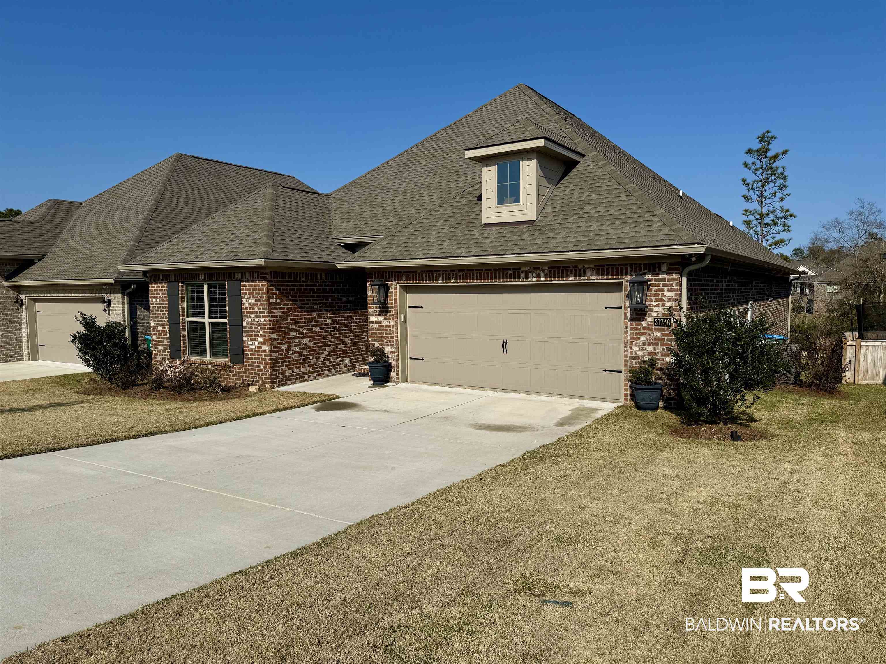 31748 Canopy Loop Spanish Fort, AL 36527 - Photo 3 of 22 View of front of property with a front lawn