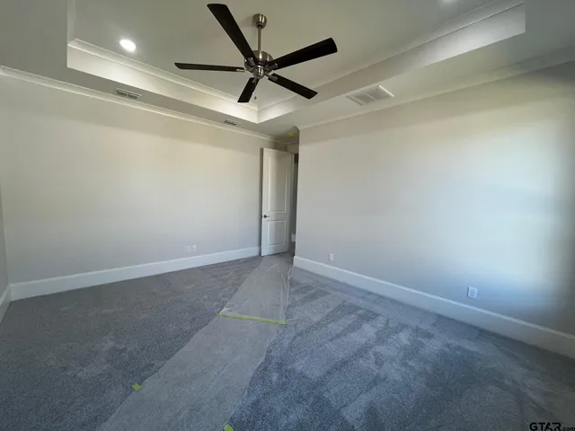a view of a big room with wooden floor