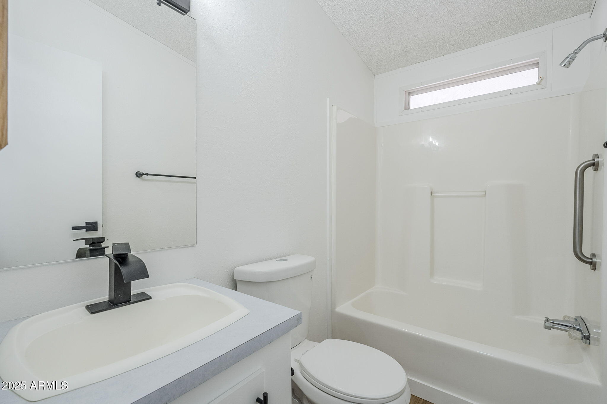 152 Scott Circle Tonto Basin, AZ 85553 - Photo 23 of 51 a bathroom with a toilet sink and bathtub