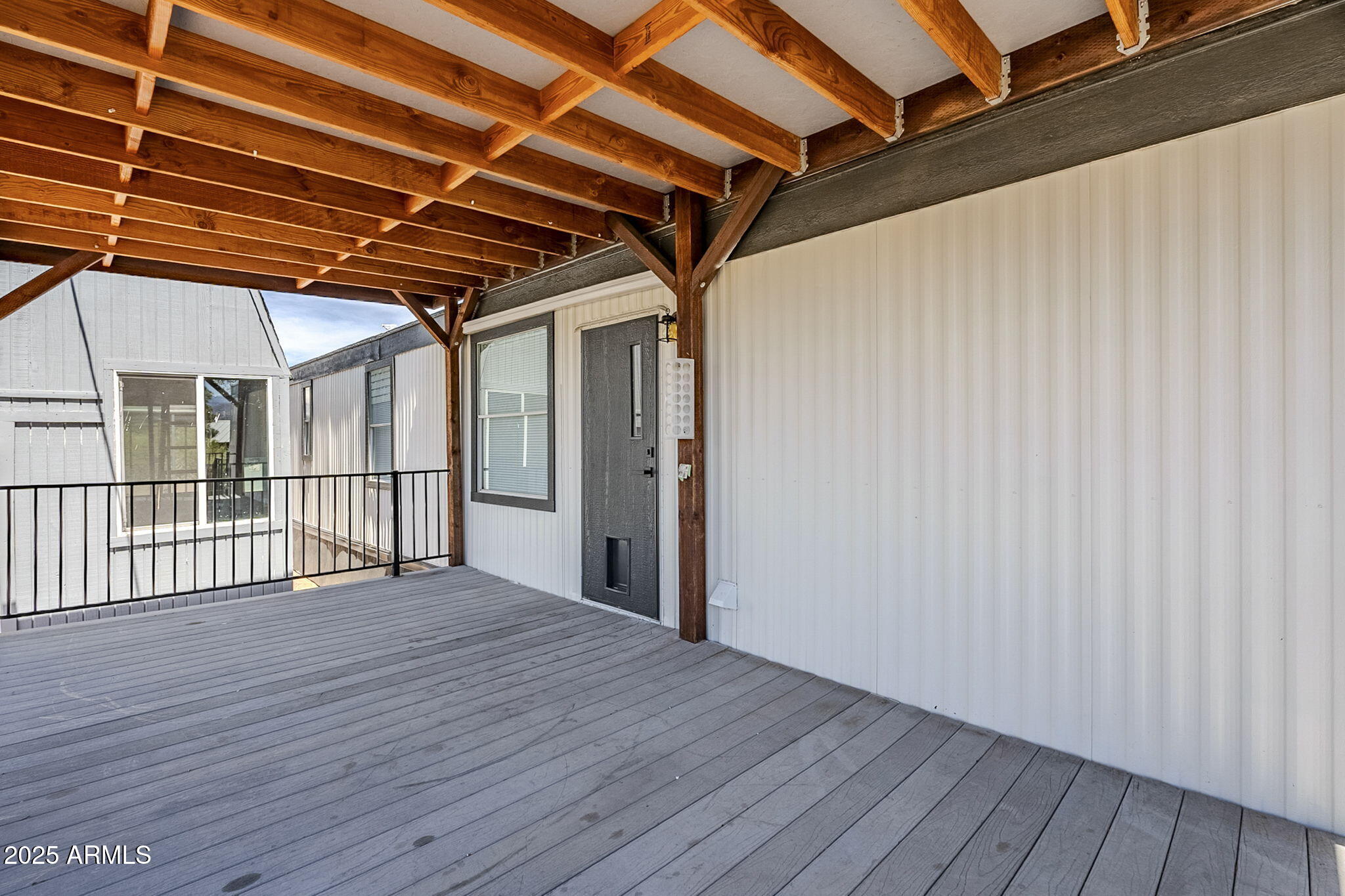 152 Scott Circle Tonto Basin, AZ 85553 - Photo 32 of 51 a view of an empty room with wooden floor