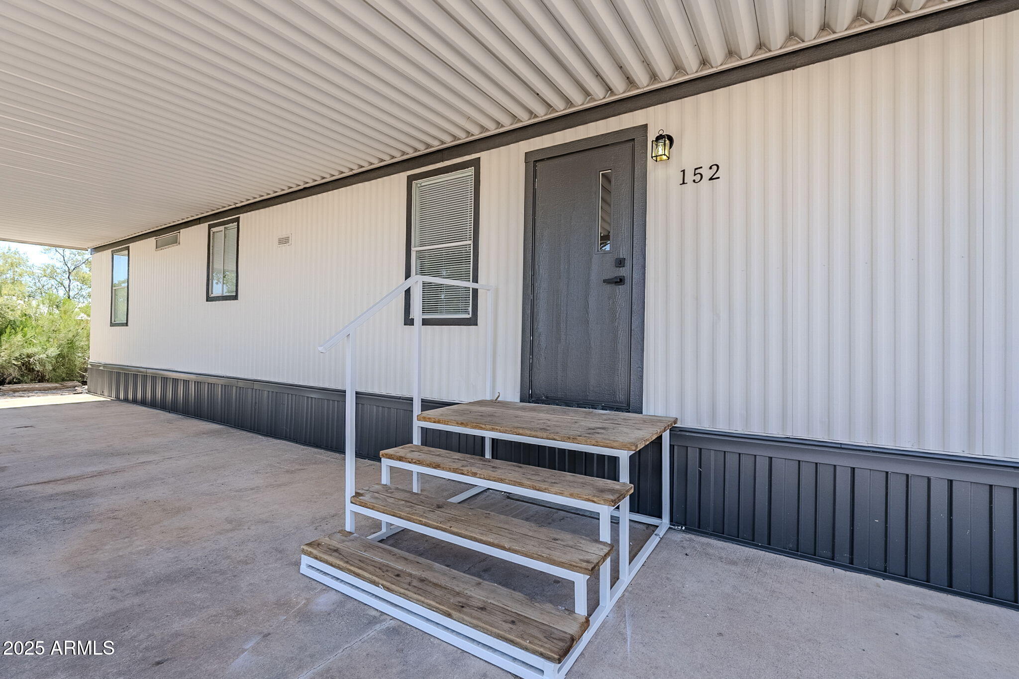 152 Scott Circle Tonto Basin, AZ 85553 - Photo 9 of 51 a view of backyard with wooden floor and fence