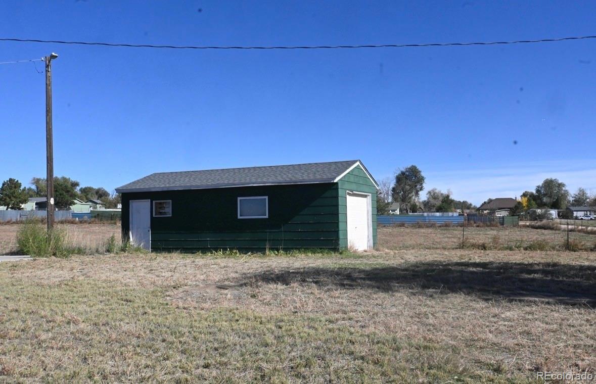 7992 County Road 31 Fort Lupton, CO 80621 - Photo 5 of 14 a view of house with backyard