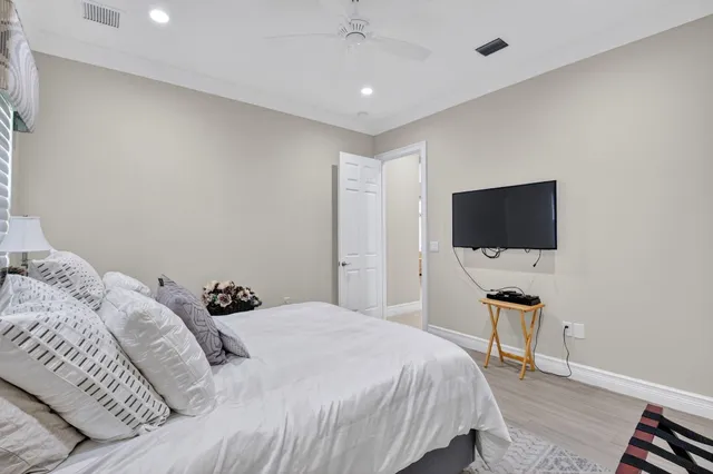 a view of living room with stainless steel appliances granite countertop furniture and a fireplace