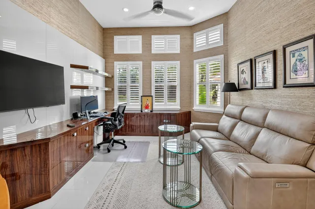 an outdoor space with patio furniture and umbrella