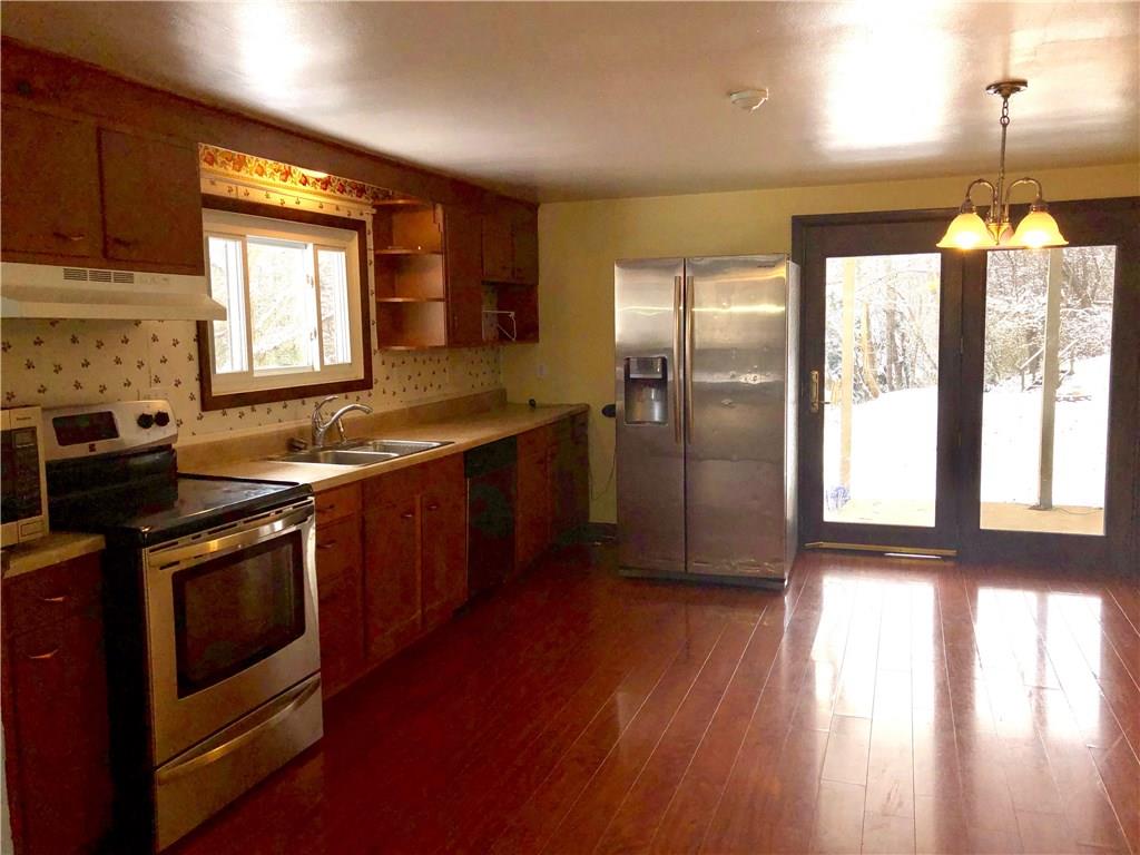 132 Park Road Apollo, PA 15613 - Photo 13 of 22 Kitchen and dining area with appliances and some updates.