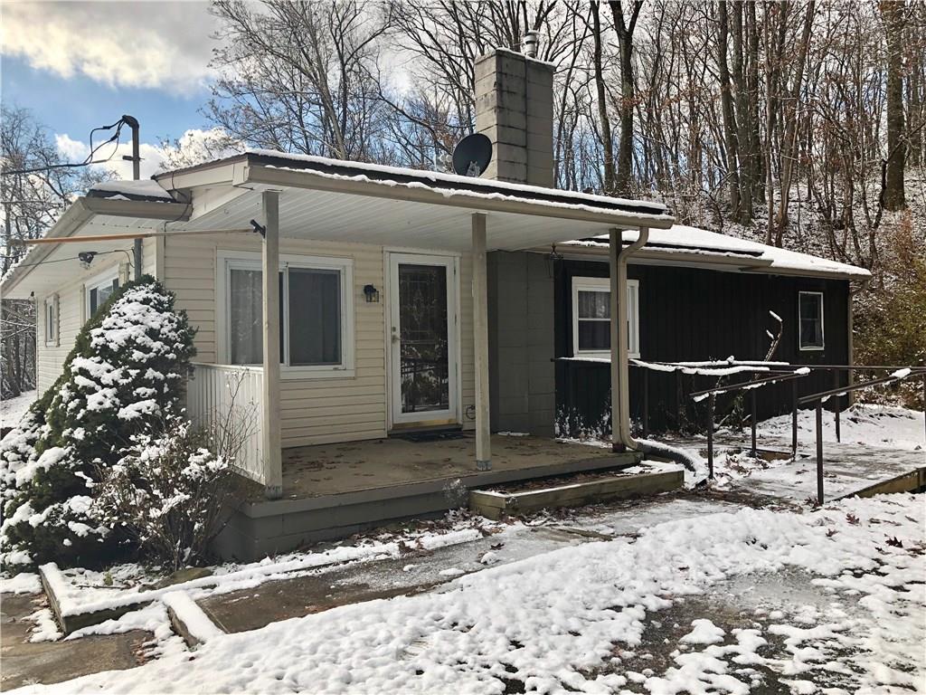 132 Park Road Apollo, PA 15613 - Photo 3 of 22 Main entrance and covered front pation with ADA ramp.