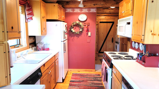 6210 Mountain View Road, Unit 133 Coalville, UT 84017 - Photo 27 of 87 Kitchen view 2: Kitchen and laundry/mud room& back door.