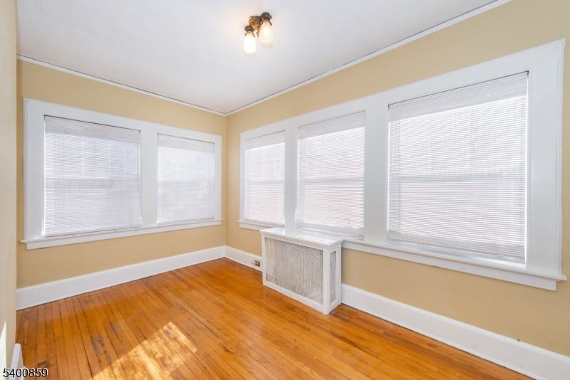 422 Valley Road, Unit 1 Montclair, NJ 07043 - Photo 20 of 24 a view of an empty room with a window