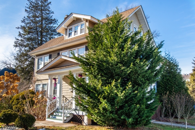 422 Valley Road, Unit 1 Montclair, NJ 07043 - Photo 3 of 24 front view of house with a tree