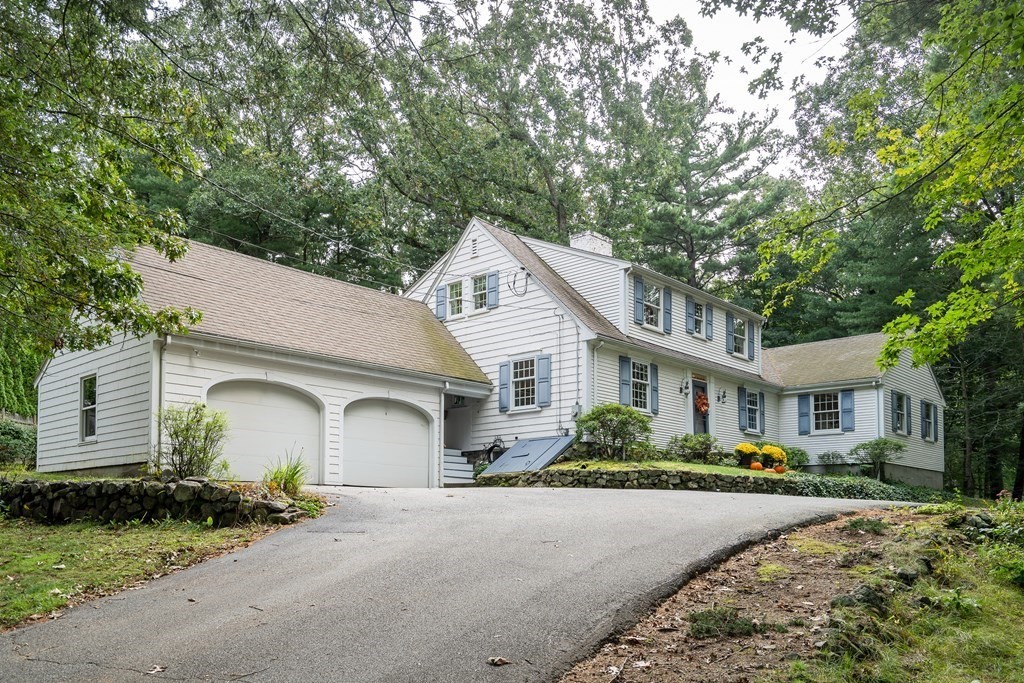 25 Fair Oaks Drive Lexington, MA 02421 - Photo 1 of 27 a front view of a house with garden