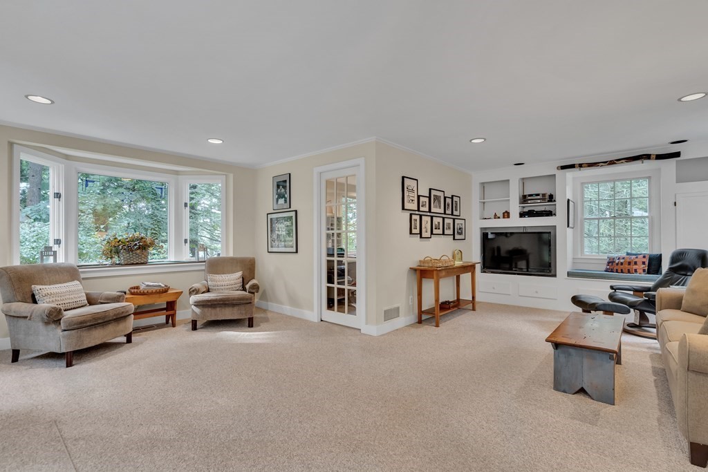 25 Fair Oaks Drive Lexington, MA 02421 - Photo 12 of 27 a living room with furniture and a large window