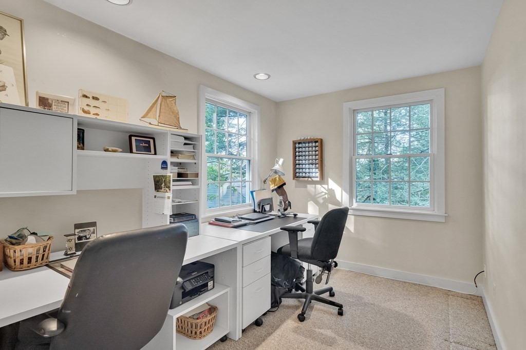 25 Fair Oaks Drive Lexington, MA 02421 - Photo 15 of 27 a view of a workspace with furniture and a window