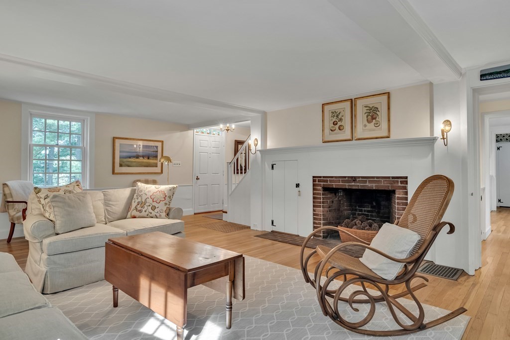 25 Fair Oaks Drive Lexington, MA 02421 - Photo 5 of 27 a living room with furniture and a fireplace