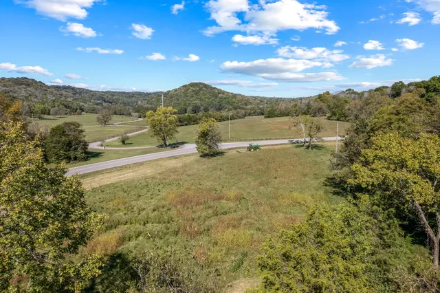 a view of a town with mountains in the background