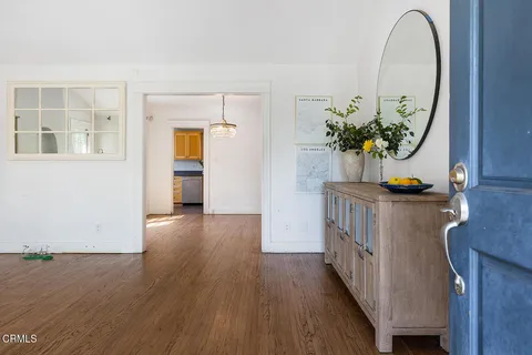 a view of entryway with wooden floor