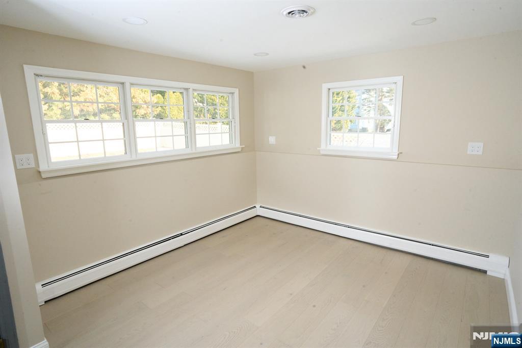 850 Ridgewood Avenue Oradell, NJ 07649 - Photo 11 of 48 an empty room with a window