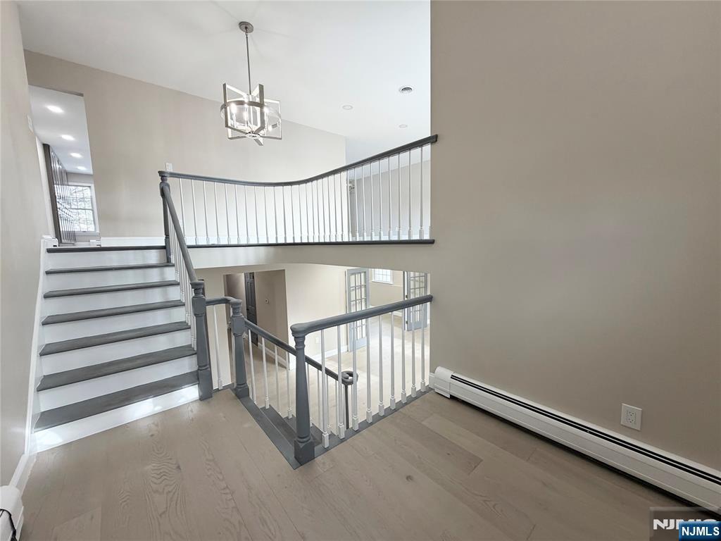 850 Ridgewood Avenue Oradell, NJ 07649 - Photo 2 of 48 a view of staircase with white walls and a window