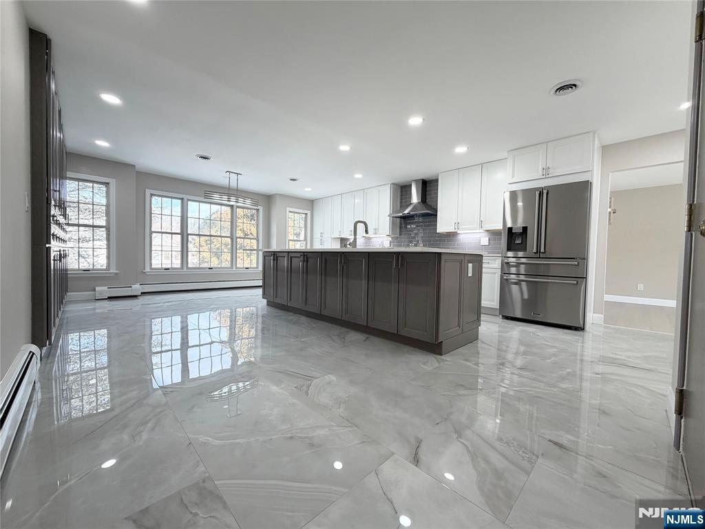 850 Ridgewood Avenue Oradell, NJ 07649 - Photo 24 of 48 a kitchen with refrigerator and window