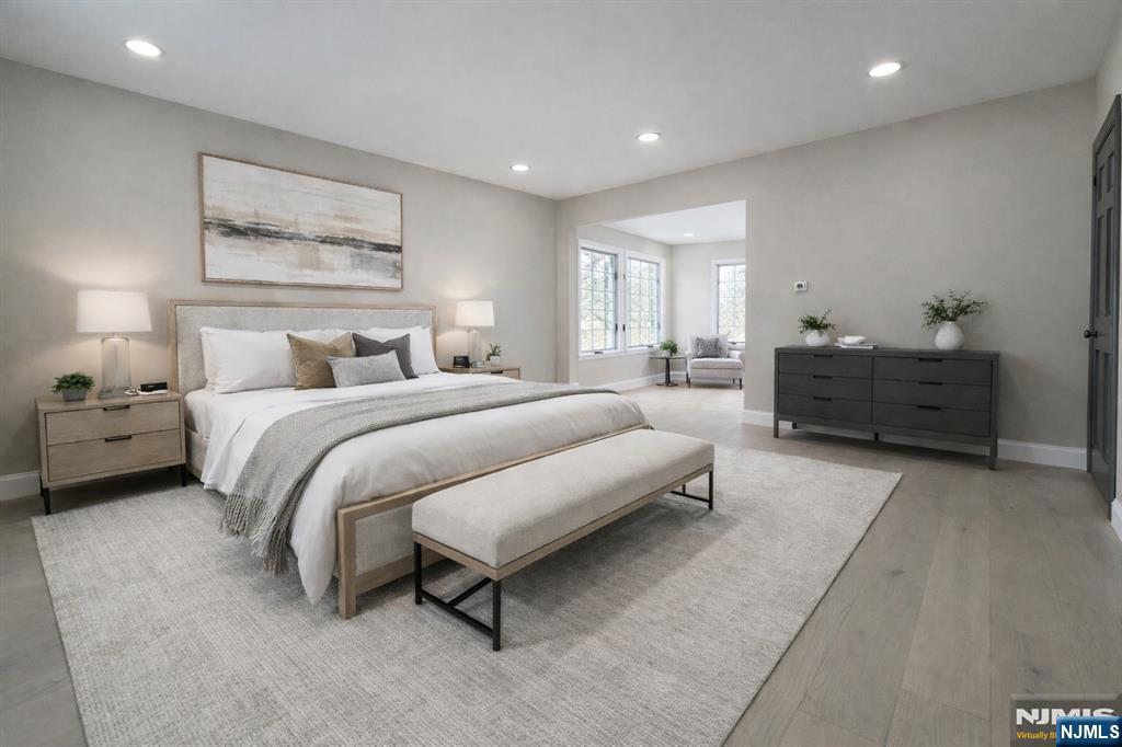 850 Ridgewood Avenue Oradell, NJ 07649 - Photo 34 of 48 a spacious bedroom with a bed and window