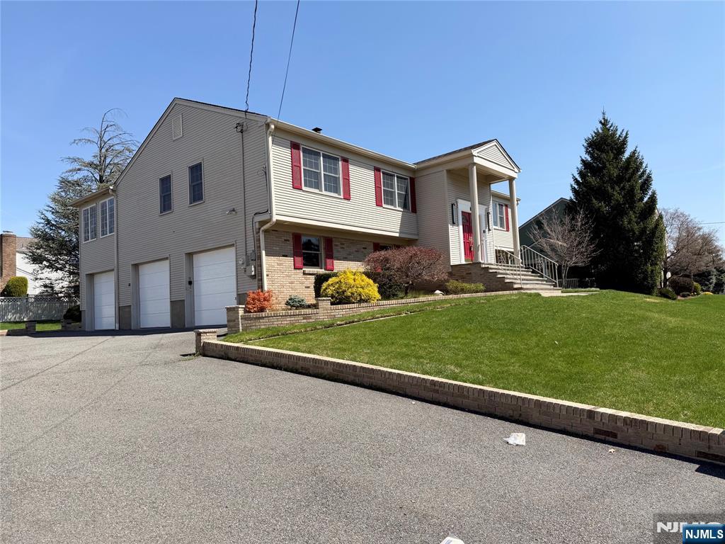 850 Ridgewood Avenue Oradell, NJ 07649 - Photo 45 of 48 a house view with garden space