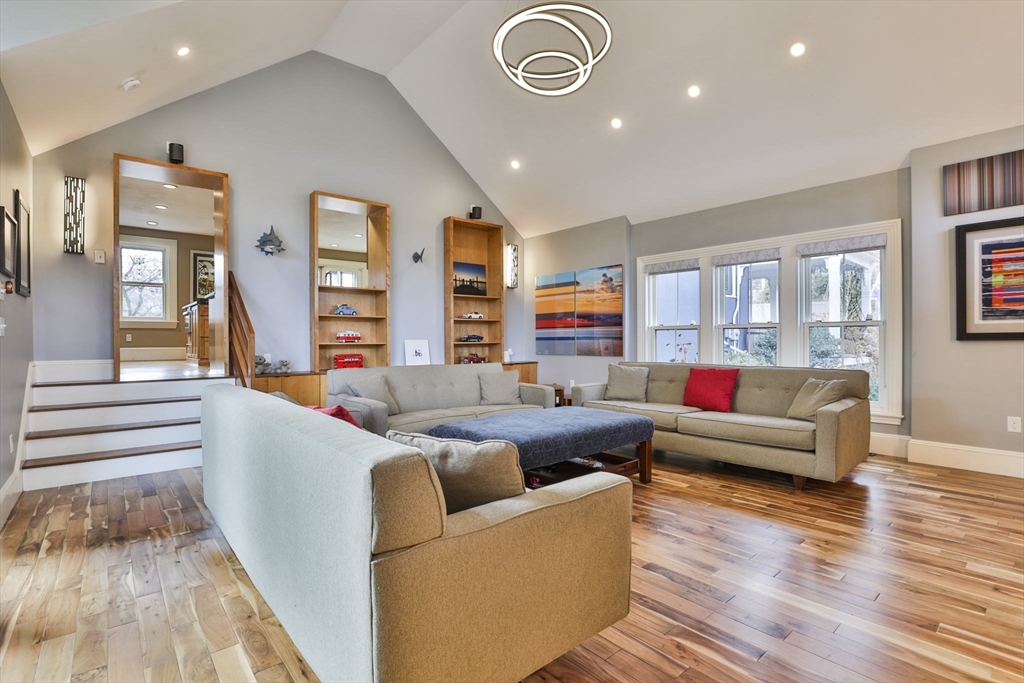630 Brush Hill Road Milton, MA 02186 - Photo 23 of 41 a living room with furniture and a wooden floor