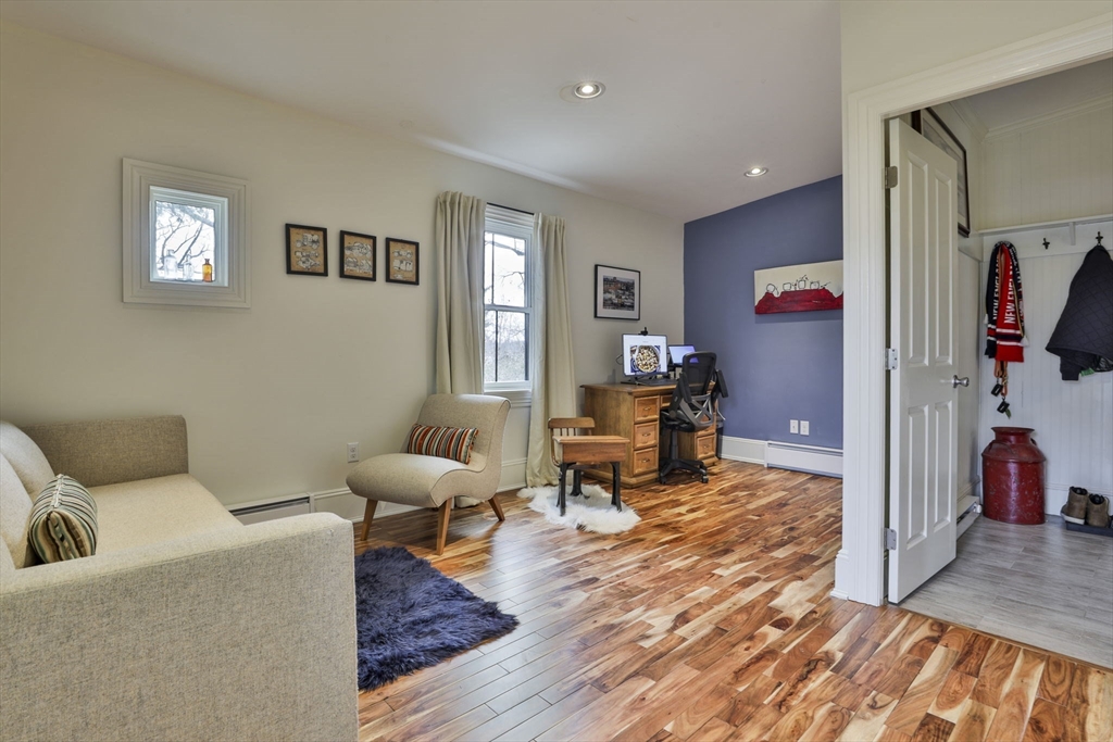 630 Brush Hill Road Milton, MA 02186 - Photo 25 of 41 a living room with furniture and wooden floor