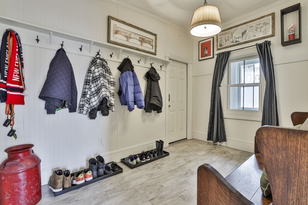 630 Brush Hill Road Milton, MA 02186 - Photo 26 of 41 a view of walk in closet with clothes and shoes