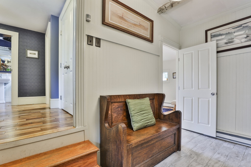 630 Brush Hill Road Milton, MA 02186 - Photo 27 of 41 a bedroom with furniture and wooden floor
