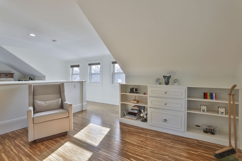 630 Brush Hill Road Milton, MA 02186 - Photo 35 of 41 a living room with furniture and wooden floor