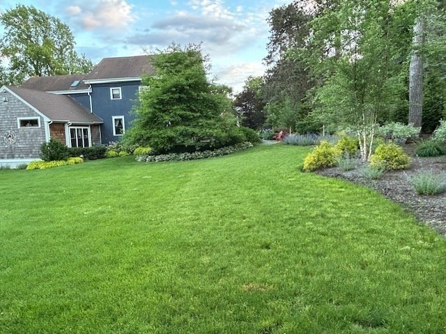 630 Brush Hill Road Milton, MA 02186 - Photo 38 of 41 a view of a house with backyard and garden