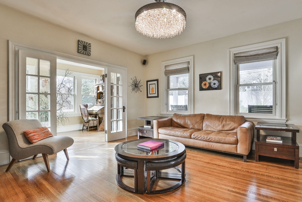 630 Brush Hill Road Milton, MA 02186 - Photo 6 of 41 a living room with furniture and a large window