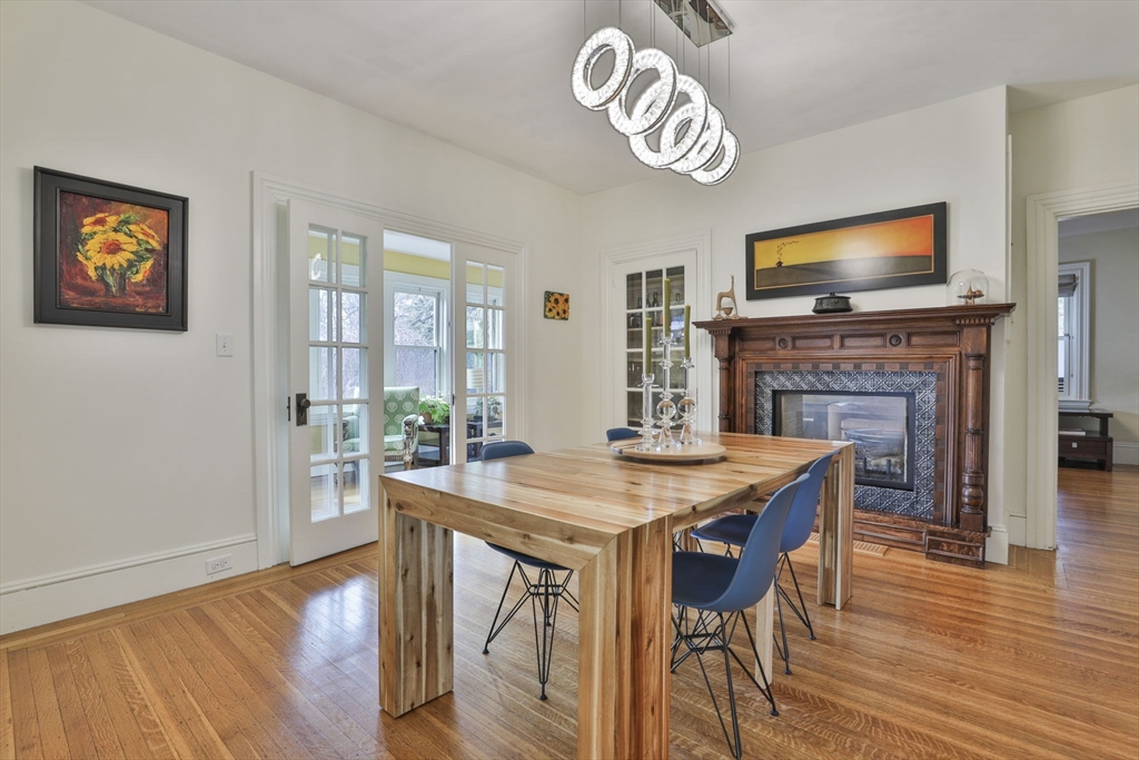 630 Brush Hill Road Milton, MA 02186 - Photo 7 of 41 a view of a dining room with furniture window and wooden floor