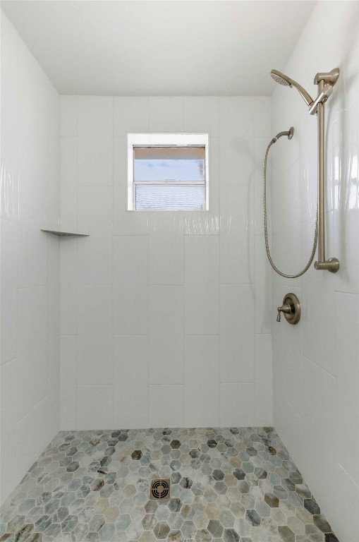 7309 Blessing Avenue Austin, TX 78752 - Photo 20 of 23 a bathroom with a sink and a mirror
