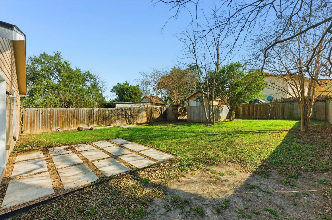 7309 Blessing Avenue Austin, TX 78752 - Photo 21 of 23 a view of backyard with tree