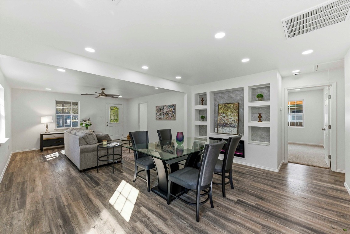 7309 Blessing Avenue Austin, TX 78752 - Photo 6 of 23 a view of a dining room with furniture and wooden floor