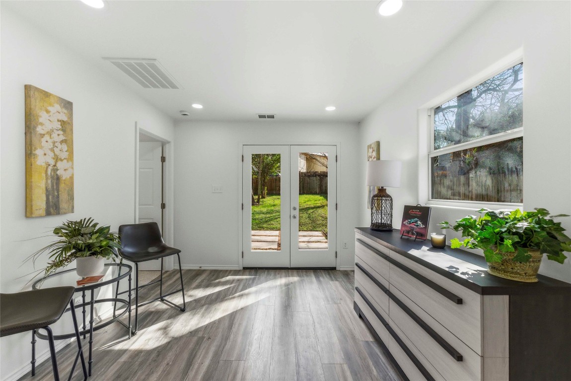 7309 Blessing Avenue Austin, TX 78752 - Photo 10 of 23 a living room with furniture and a potted plant