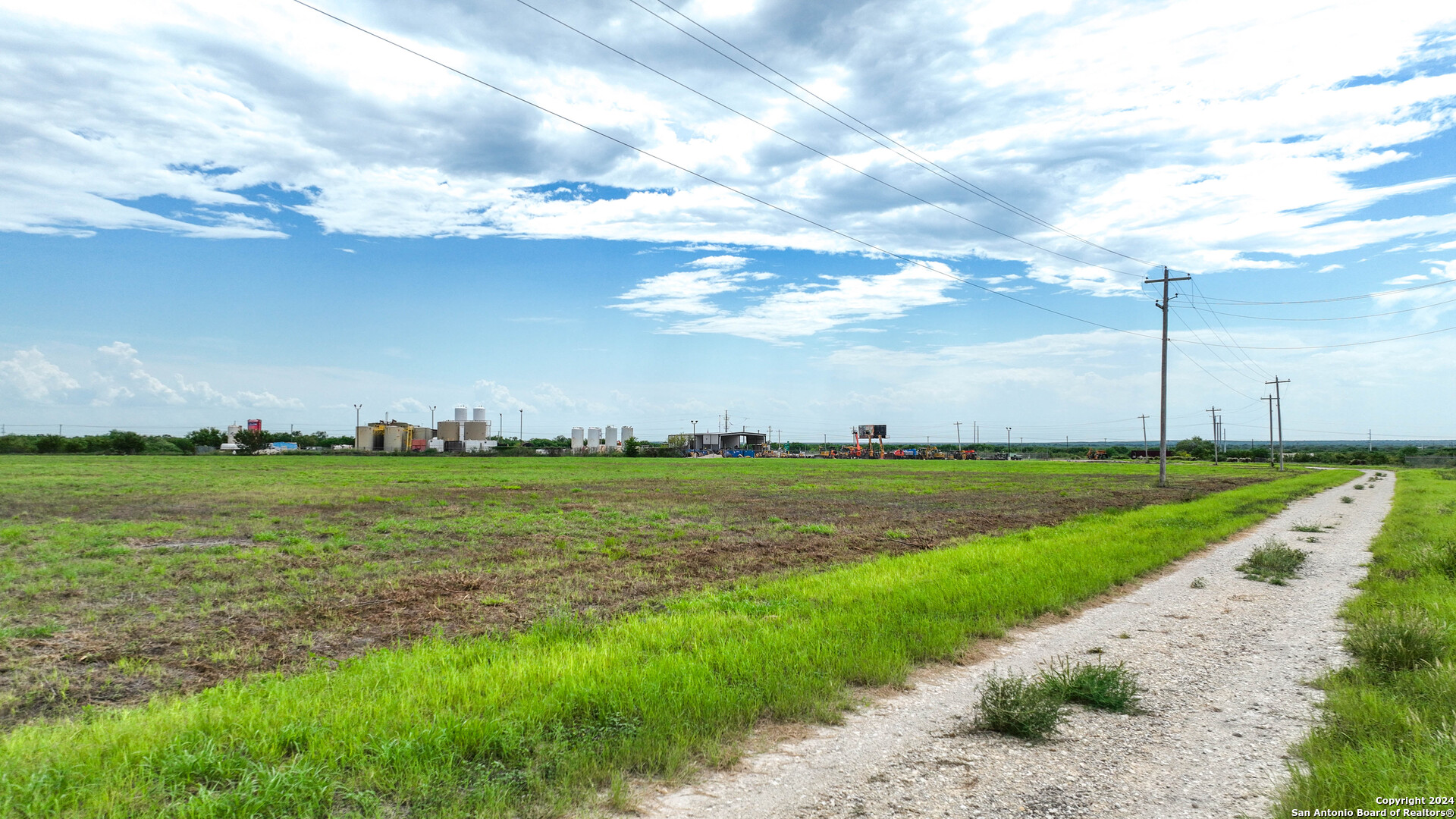 0 North I-37 Access Road Three Rivers, TX 78071 - Photo 5 of 11 a view of a lake with houses in the back